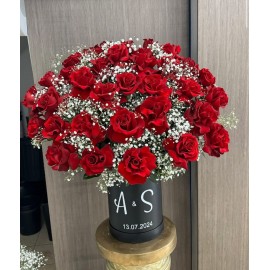 Fresh red roses with baby breath 